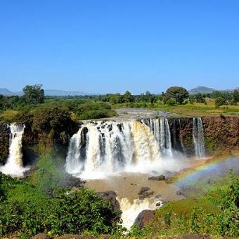 The Blue Nile Falls is a waterfall on the Blue Nile river in Ethiopia. It is known as Tis Abay in Amharic, It is situated on the upper course of the river, about 30 km downstream from the town of Bahir Dar and Lake Tana